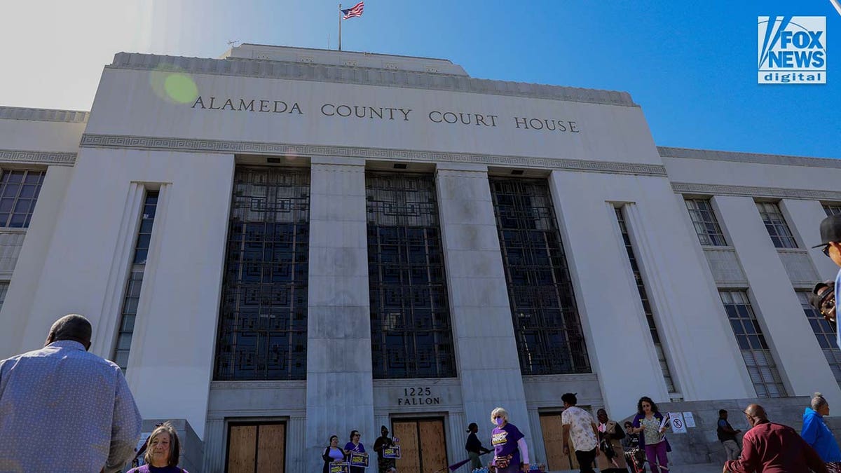 Supporters of Alameda County DA, Pamela Rice gather at a rally outside of Alameda County Courthouse