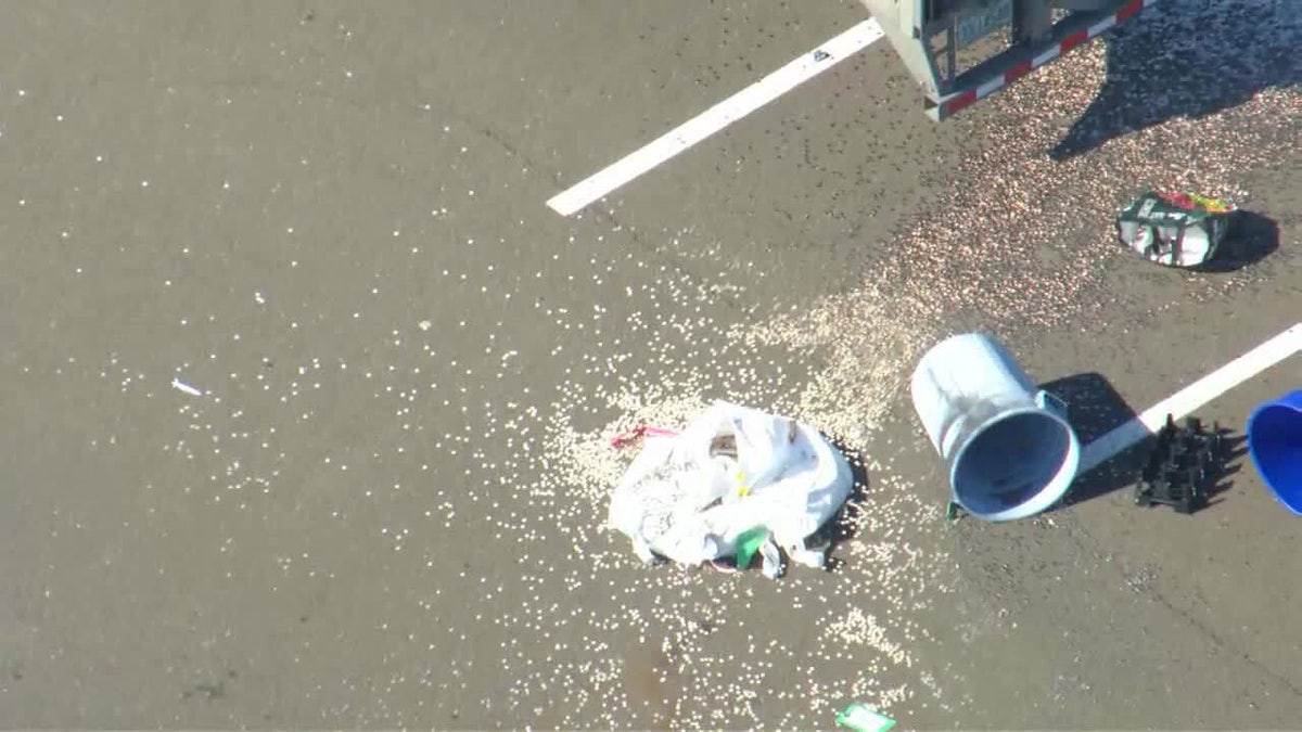 loose dimes strewn across parking lot