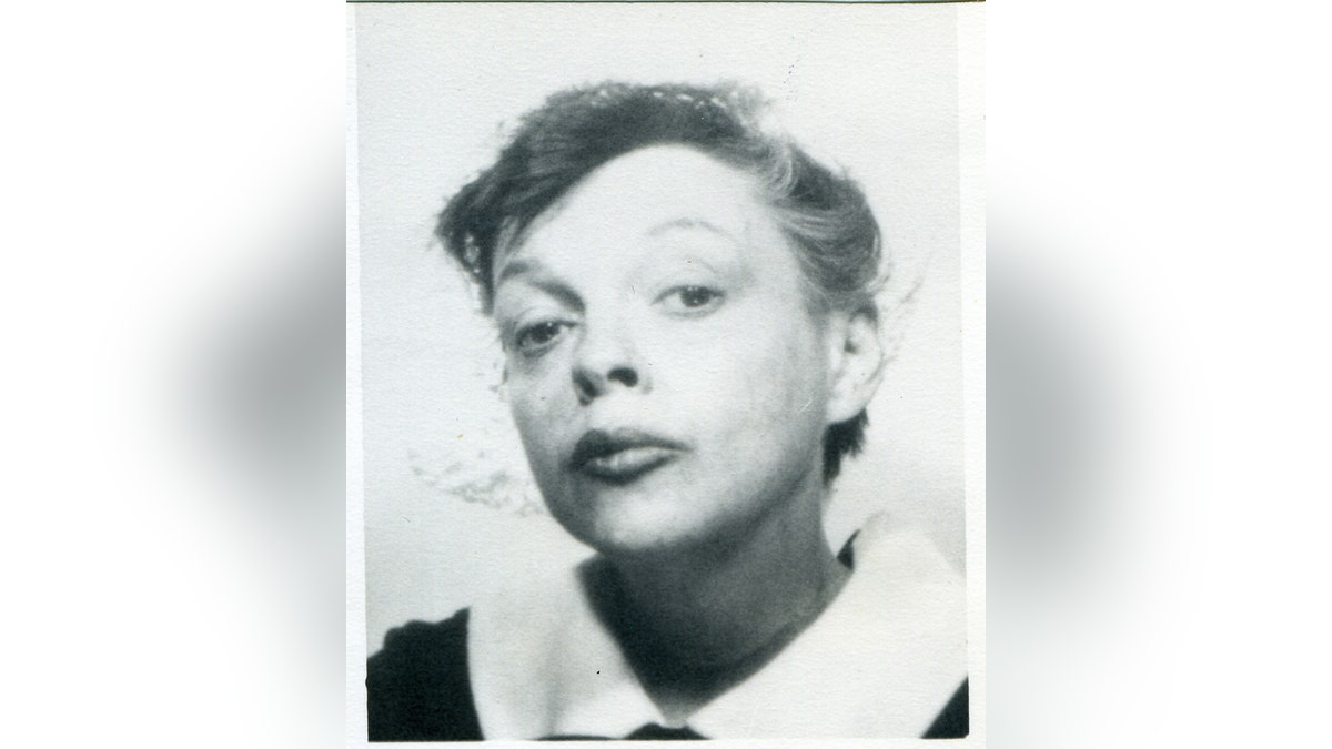 A close-up of Judy Garland looking directly at the camera