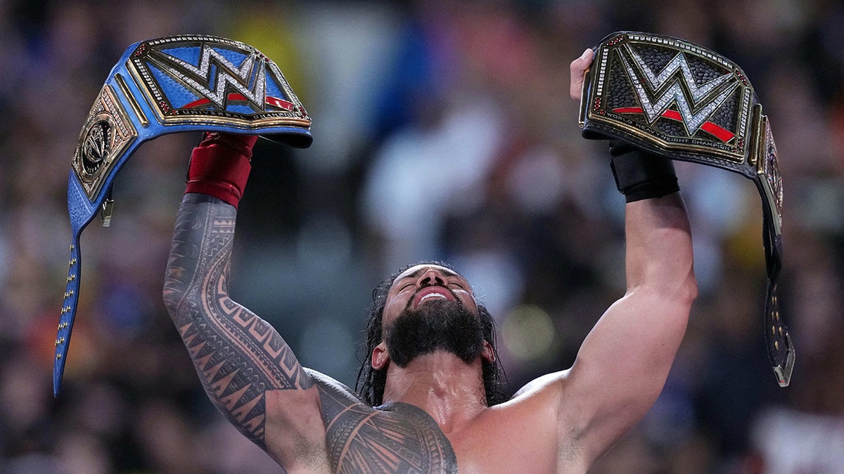 Roman Reigns hold the titles
