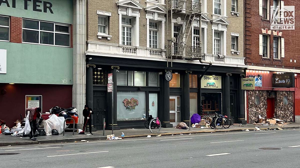 People inhabit encampments on the streets of San Francisco's Mission District.