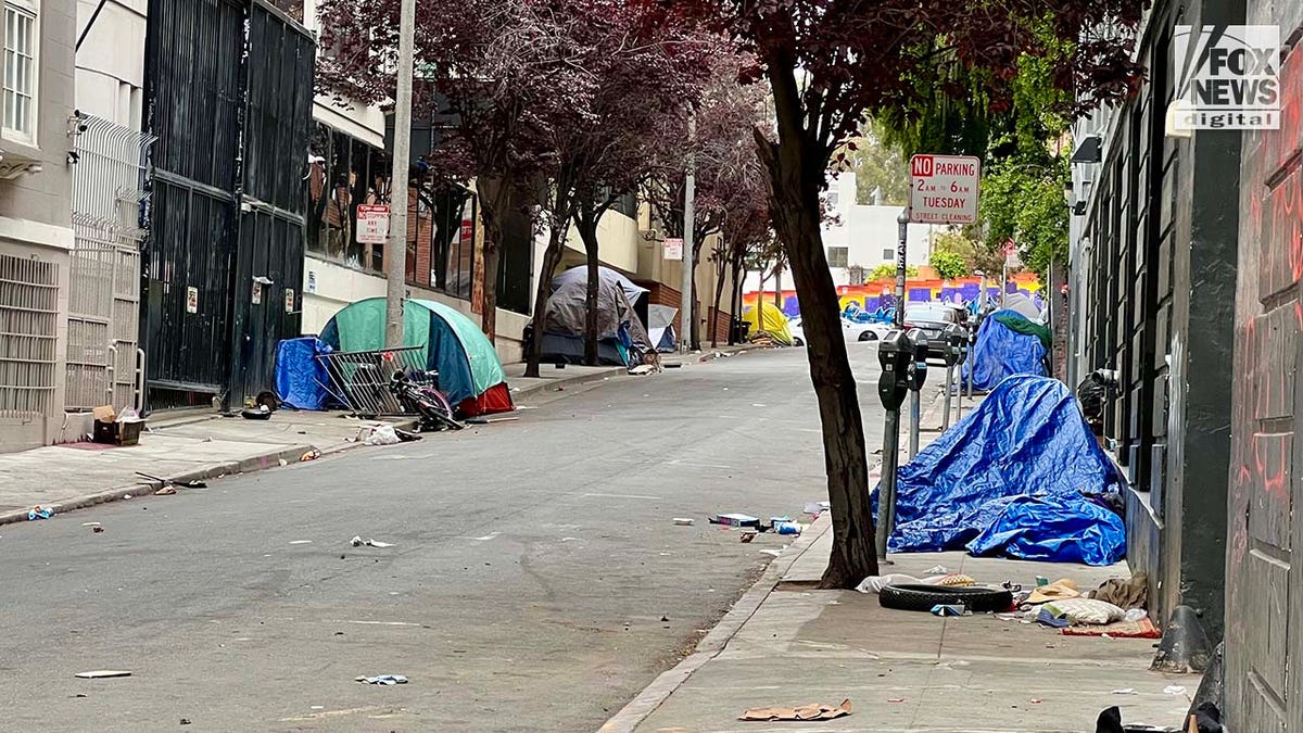 People inhabit encampments on the streets of San Francisco's Mission District.