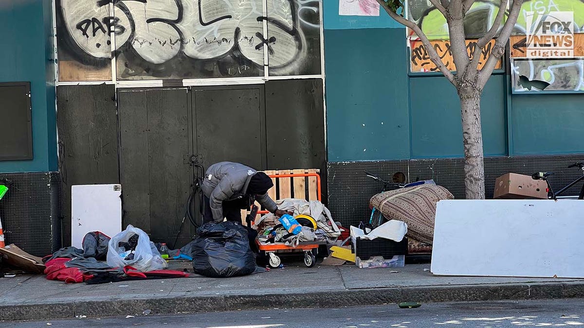 People inhabit encampments on the streets of San Francisco's Mission District.