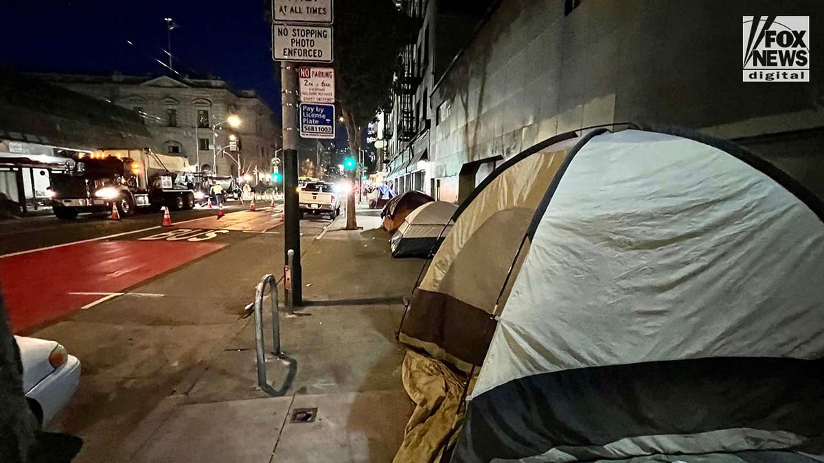 People inhabit encampments on the streets of San Francisco's Tenderloin District.