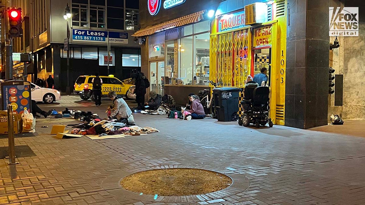 People inhabit encampments on the streets of San Francisco's Tenderloin District.
