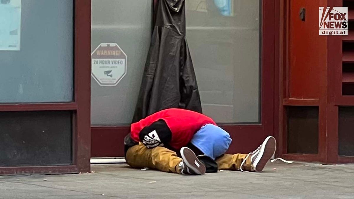 People inhabit encampments on the streets of San Franciscos Tenderloin District.