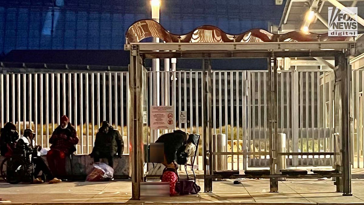 People inhabit encampments on the streets of San Francisco's Tenderloin District.