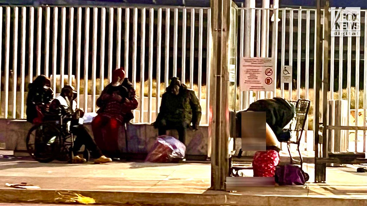 People inhabit encampments on the streets of San Franciscos Tenderloin District.