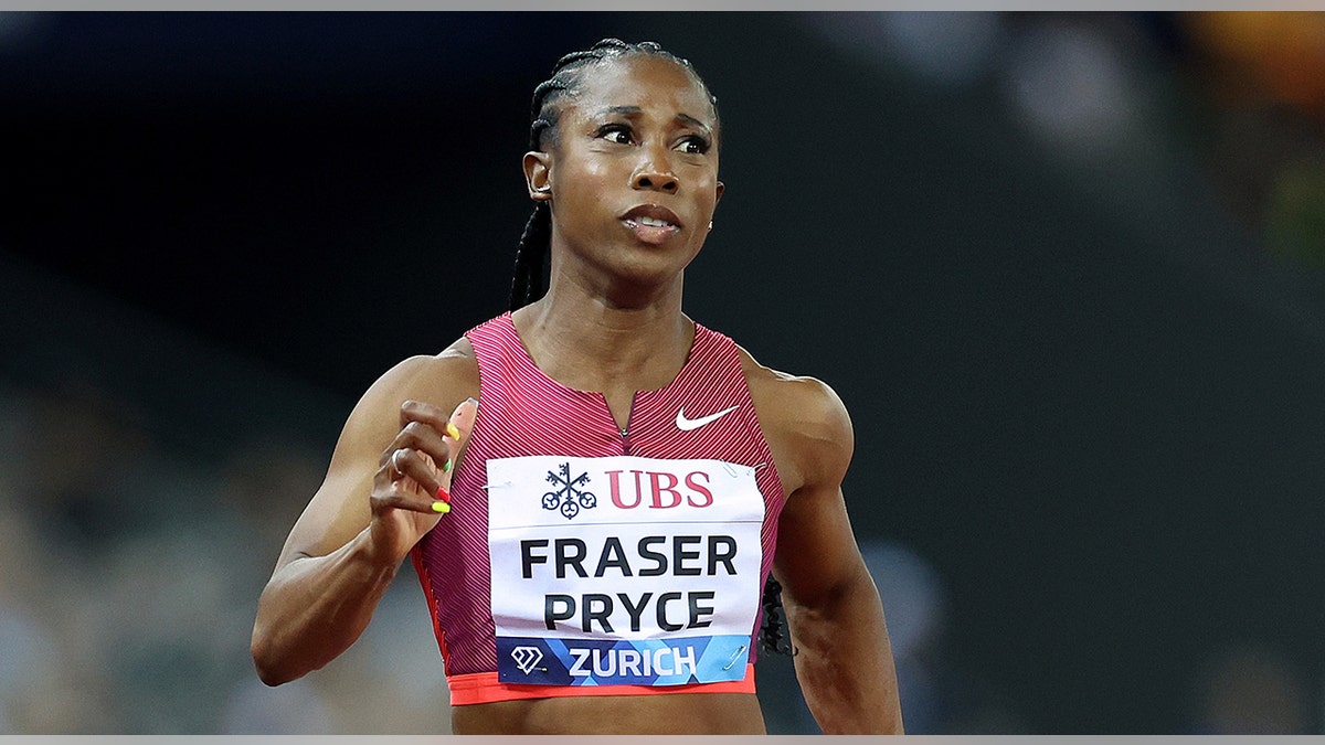 Shelly-Ann Fraser-Pryce crosses finish line