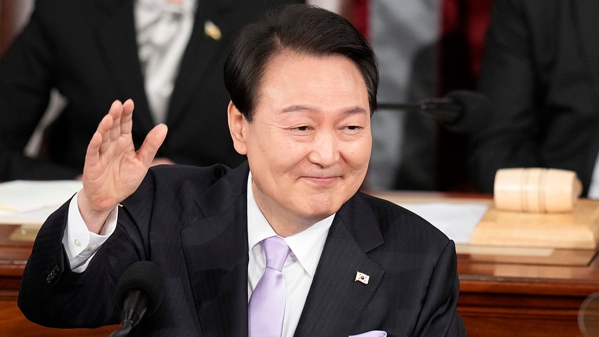 South Koreas President Yoon Suk Yeol waves to joint meeting of the US Congress