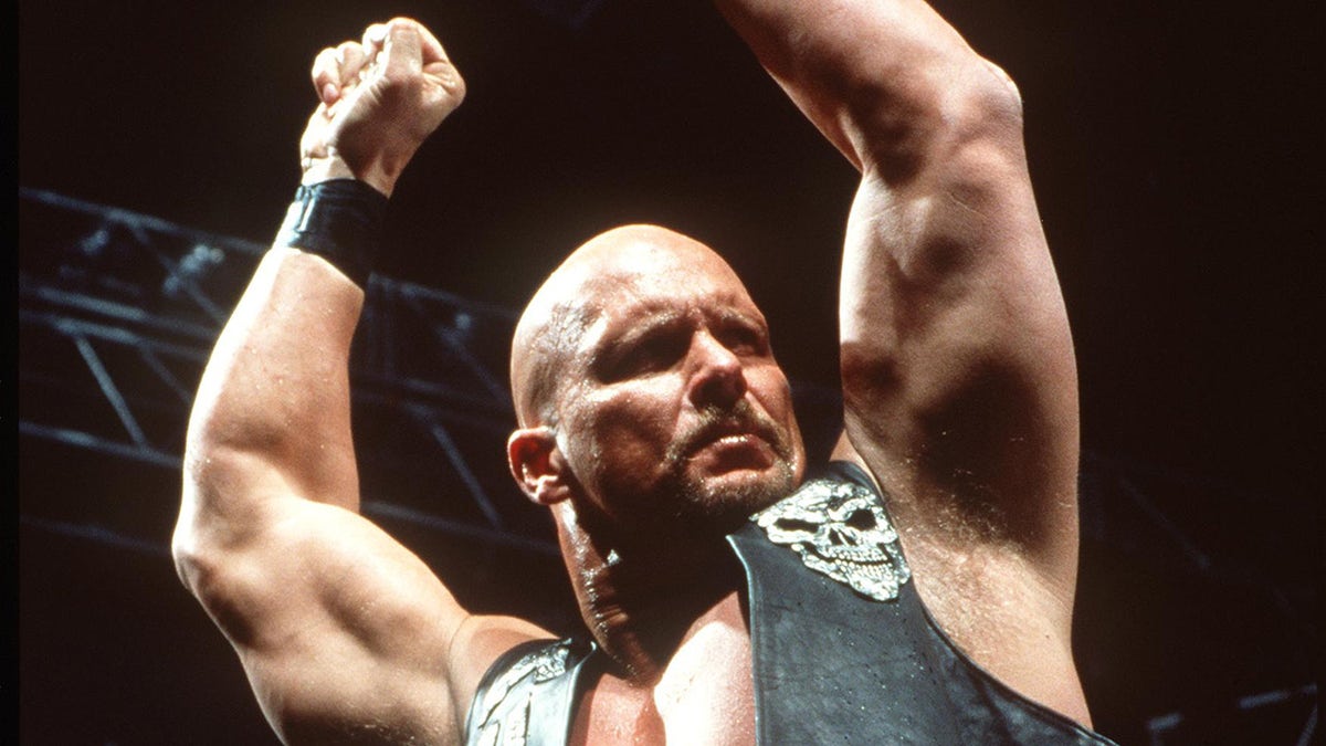 Steve Austin raises his hands