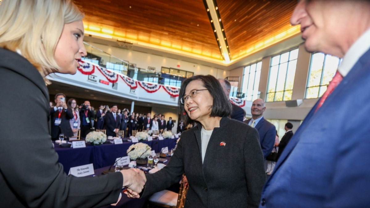 Taiwan President Tsai Ing-wen is greeted