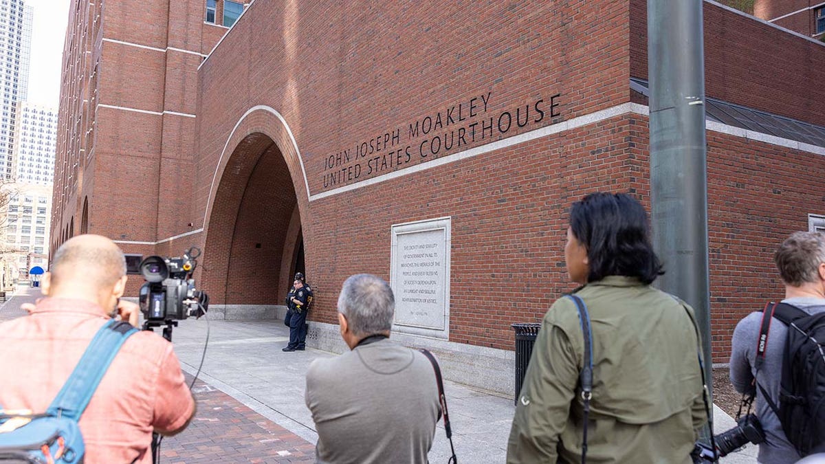 Media outside of John Joseph Moakley United States Courthouse before the arraignment of Jack Teixeira