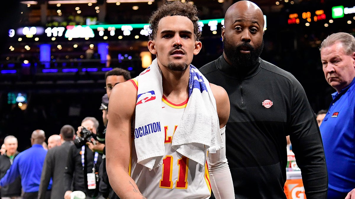 Trae Young walks off the floor