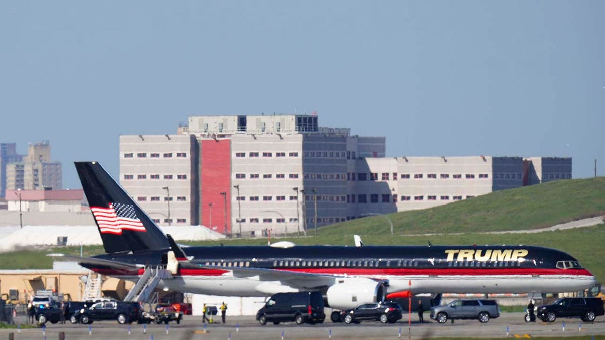 Former President Donald Trump's plane sits on the tarmac at LaGuardia Airport