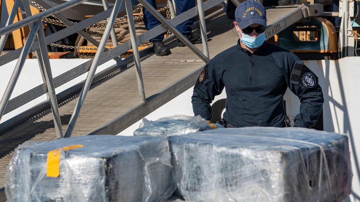 coast guard offloading cocaine bales