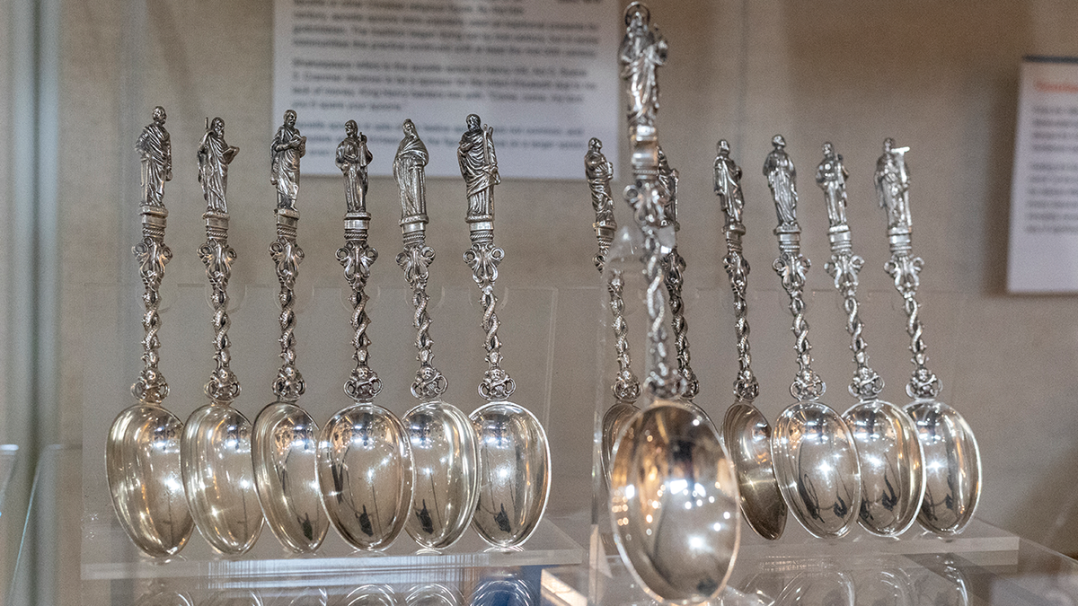A set of silver spoons on display at Unclaimed Baggage Museum.