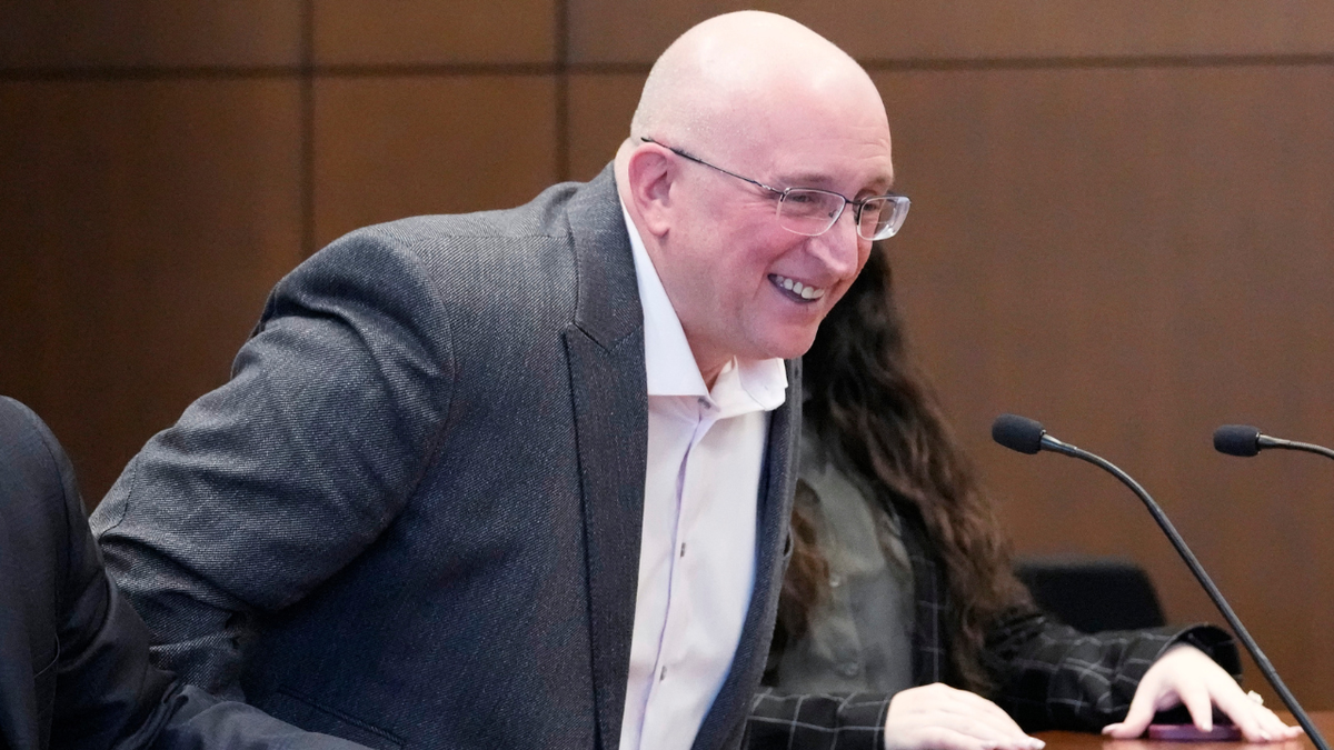 Robert E. Crimo Jr., smiles as he stands after an appearance before Judge George D. Strickland at the Lake County Courthouse, Tuesday, April 4, 2023, in Waukegan, Ill. 