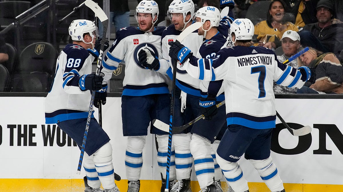 Jets players celebrates