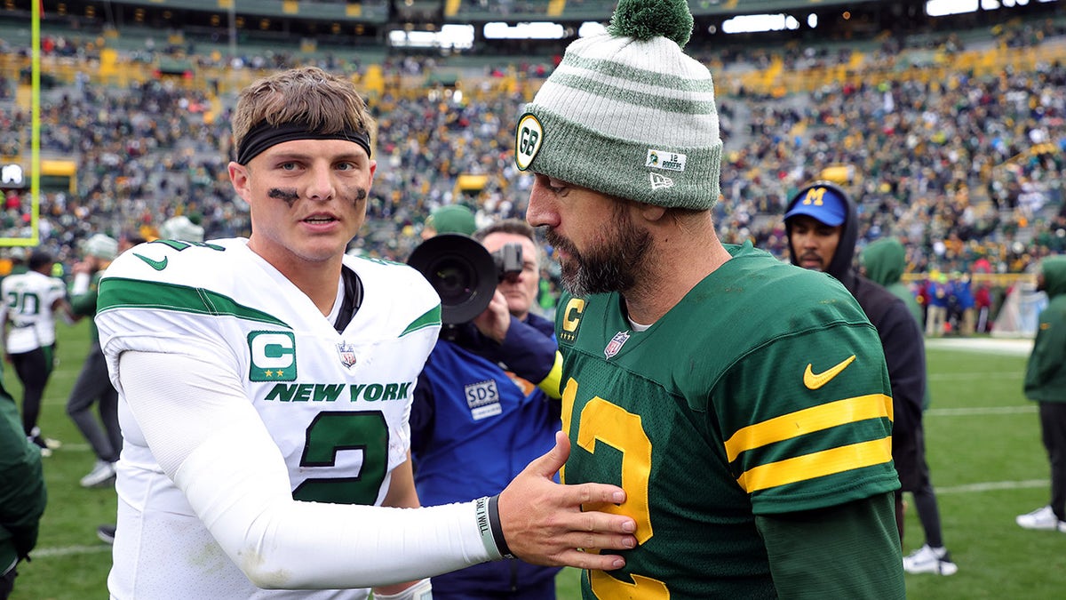 Zach Wilson and Aaron Rodgers