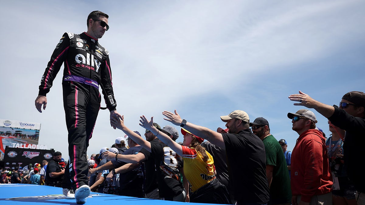 Alex Bowman greeting fans