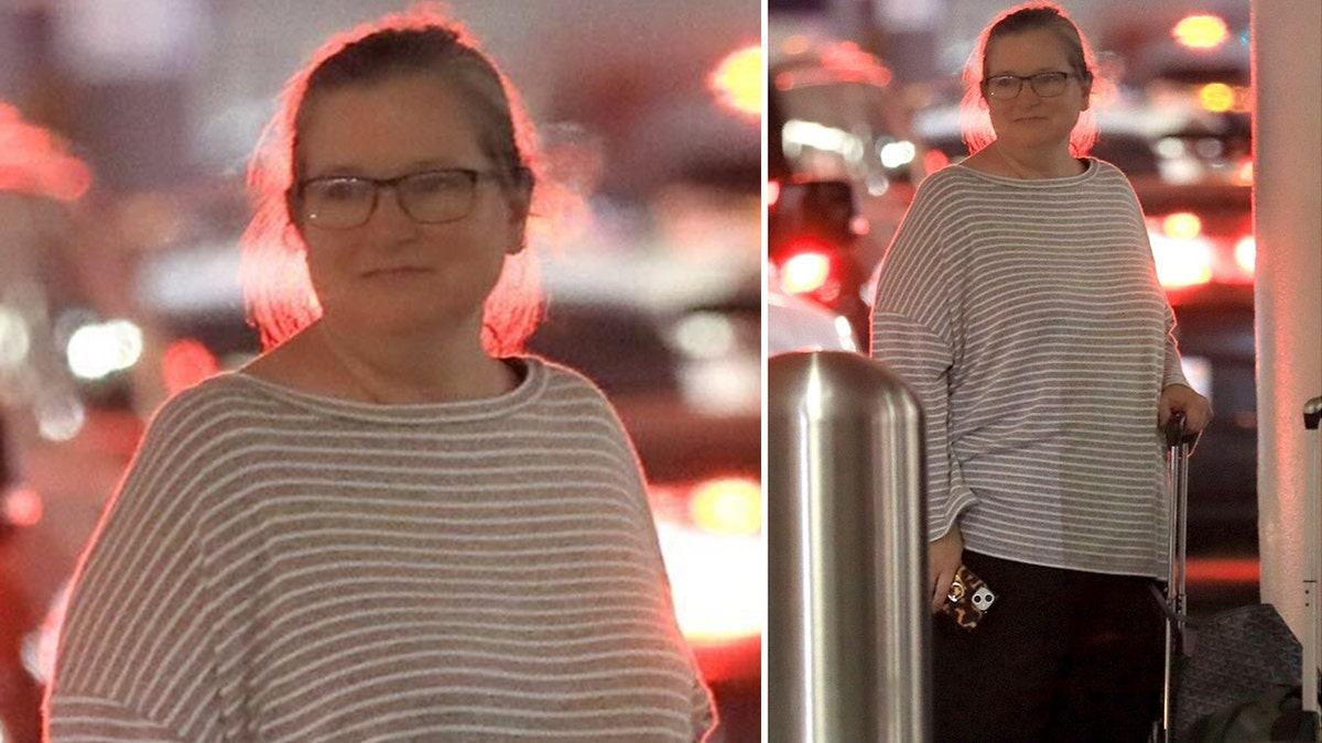 Bridget Fonda waits for a car service outside of LAX in Los Angeles