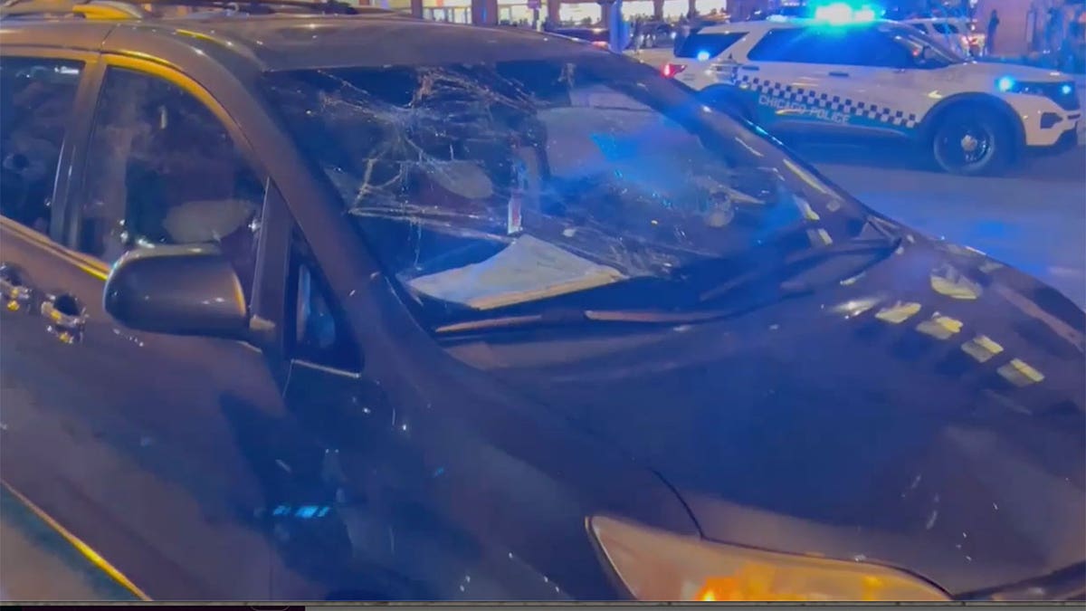 Smashed car window Chicago