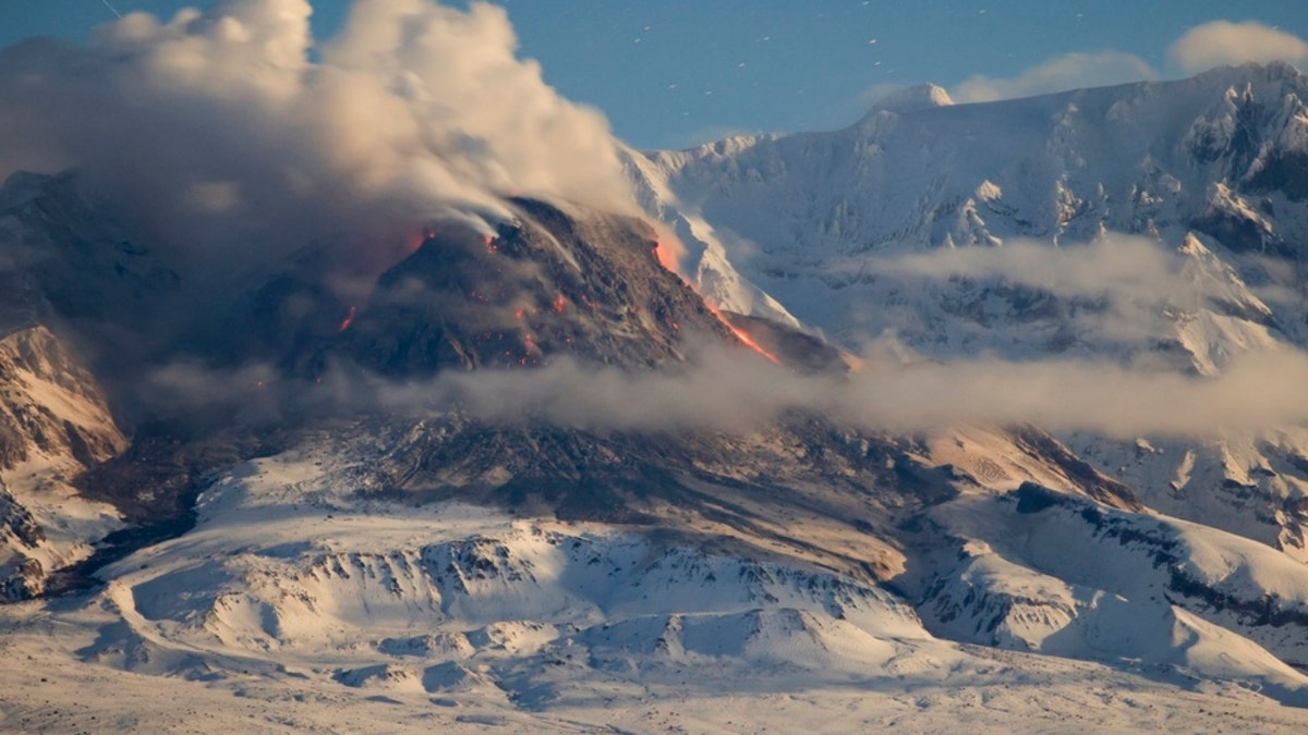 Lava and steam are visible during the the Shiveluch volcano's eruption