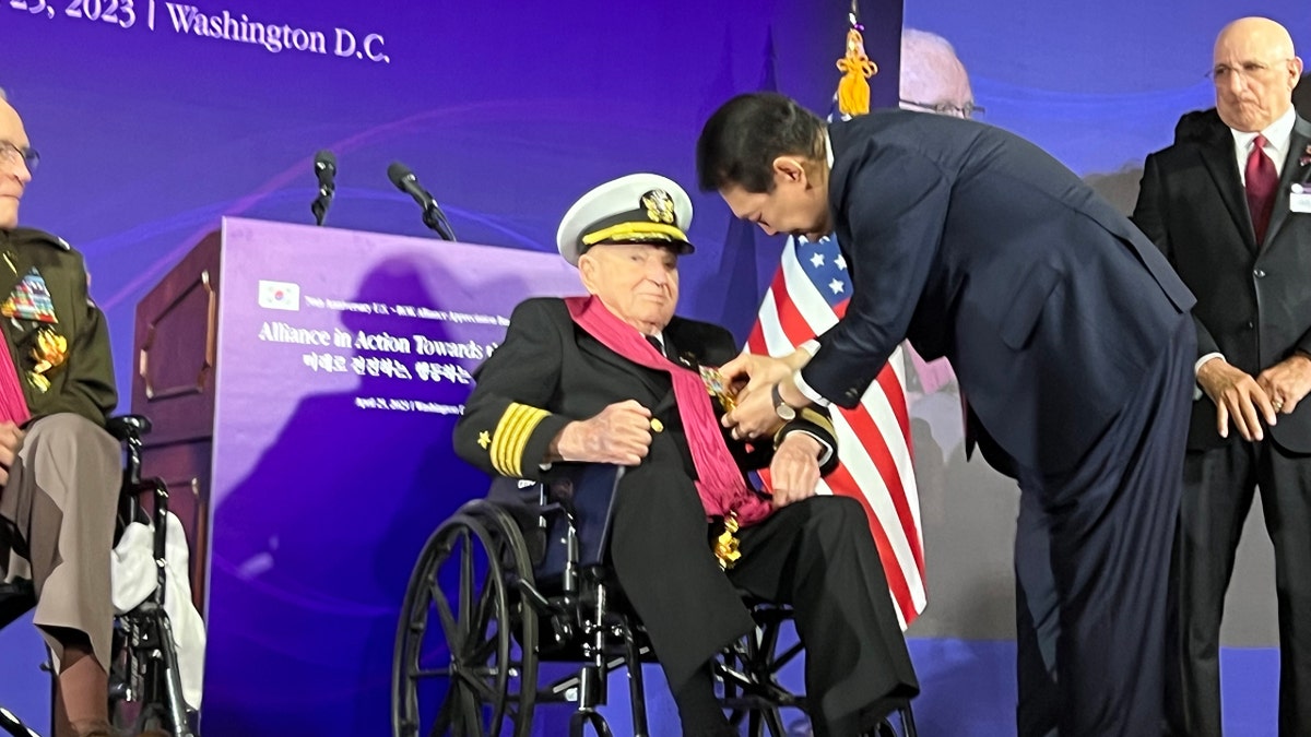 Royce Williams receiving military merit honor