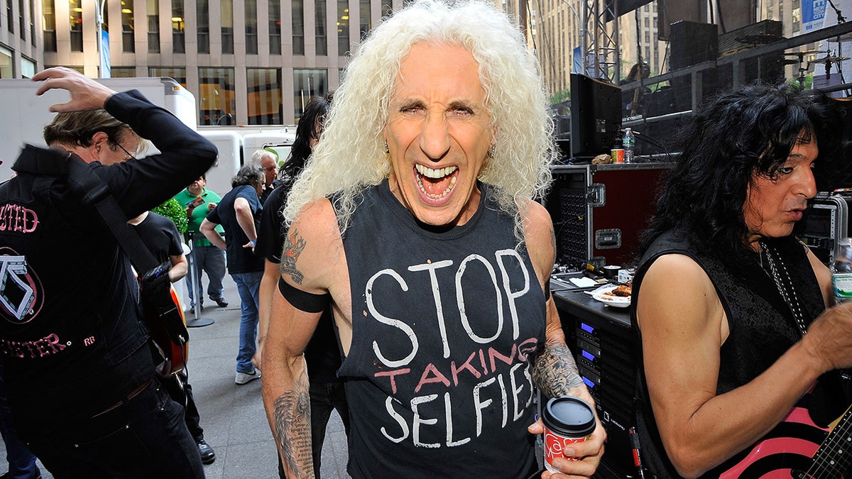 Dee Snider flashes his signature smile before performing concert
