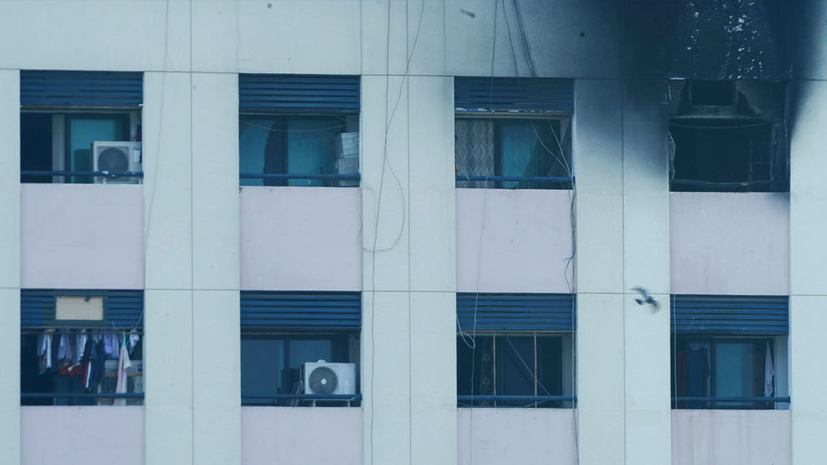 Char marks are seen after a fire broke out at an apartment in Dubai, United Arab Emirates, on April 16, 2023. 