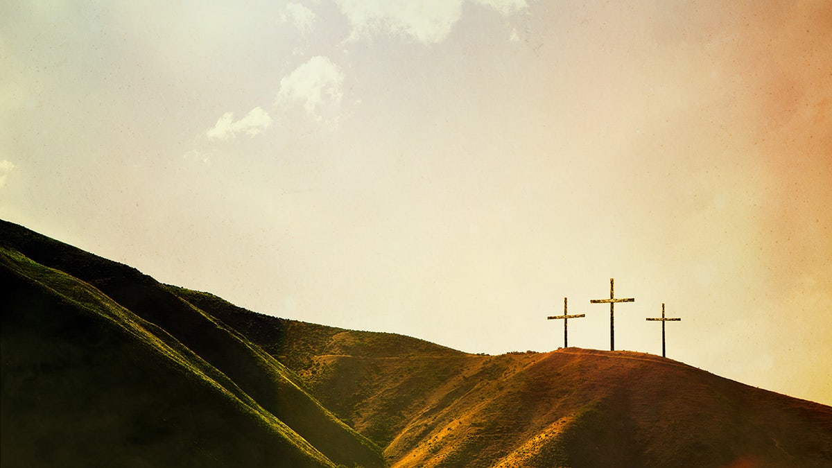 three crosses on a hill