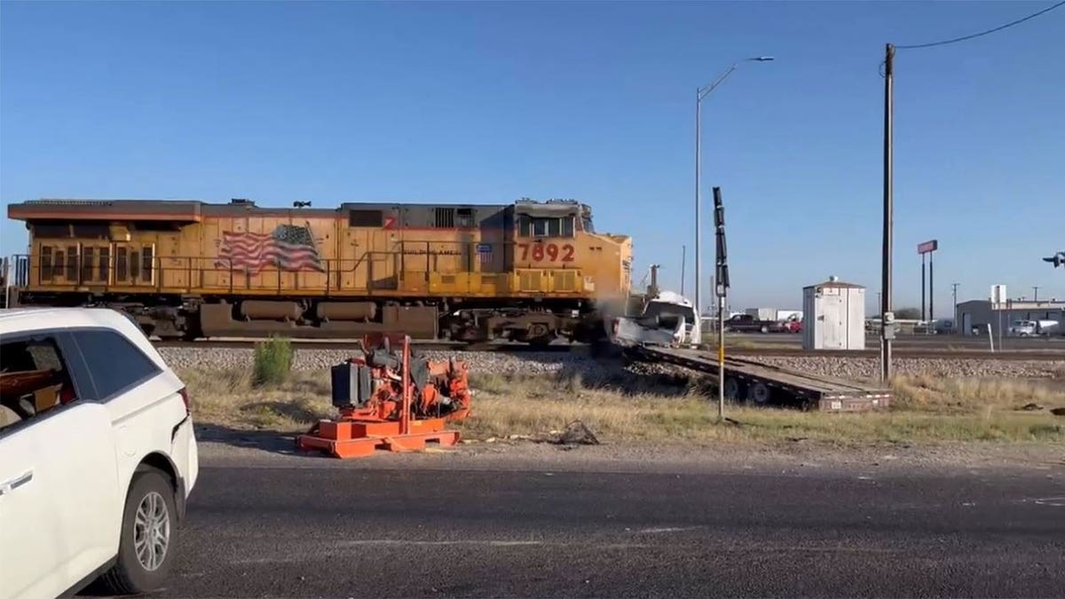 Freight Train smashes into truck