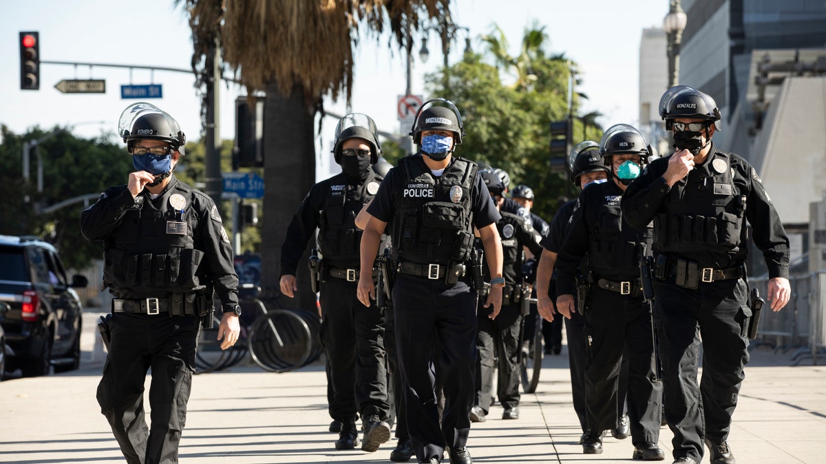 January 20, 2021: Los Angeles Police Department (LAPD) officers march in formation.
