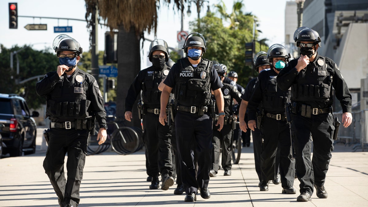 January 20, 2021: Los Angeles Police Department (LAPD) officers march in formation.