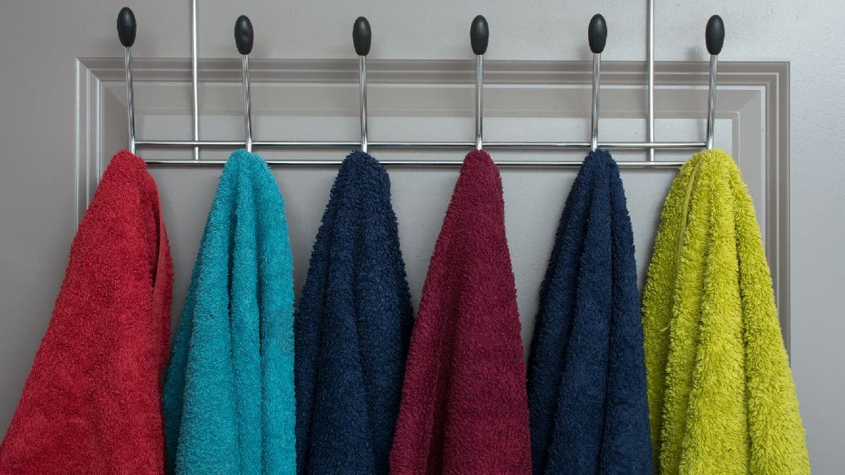 Bath towels hanging on bathroom hooks