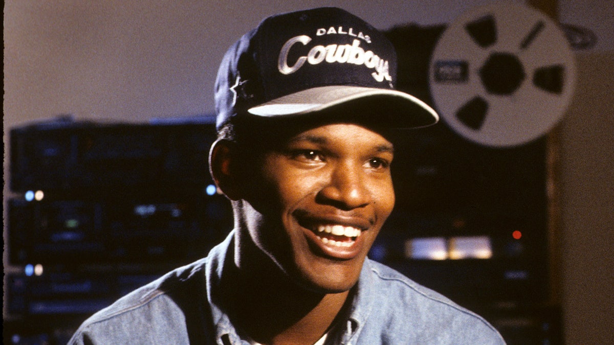 Jamie Foxx wore a Dallas Cowboys hat and denim shirt during the interview
