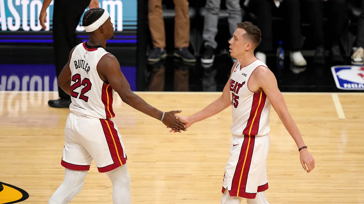 Jimmy Butler and Duncan Robinson