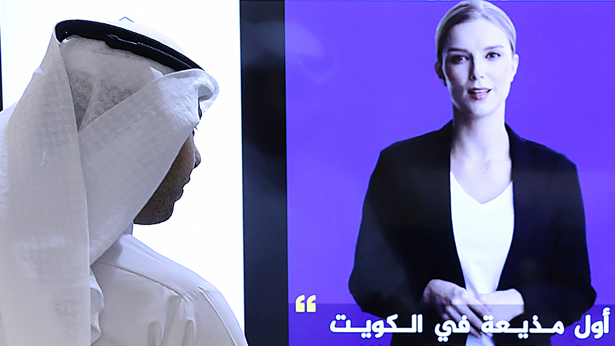 AI newscaster shown at right for Kuwait news service