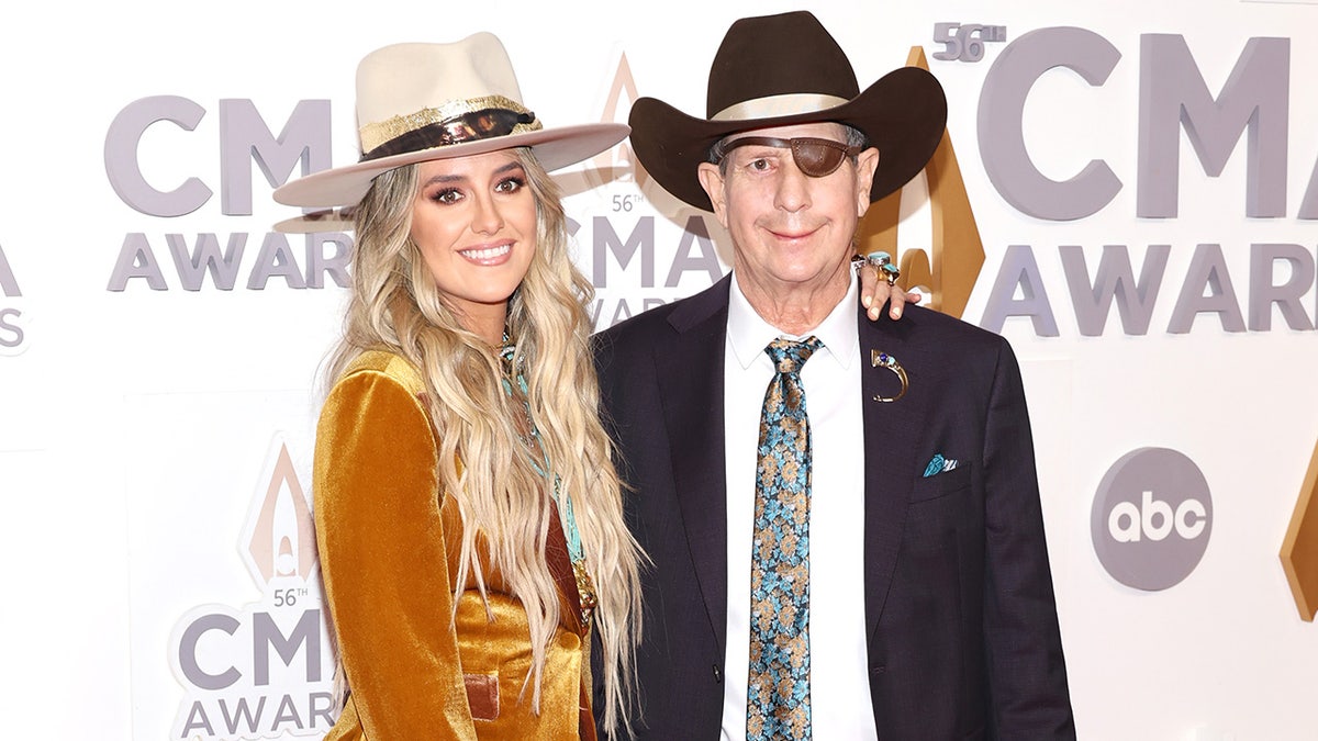 Lainey Wilson and her father walk red carpet at CMA Awards