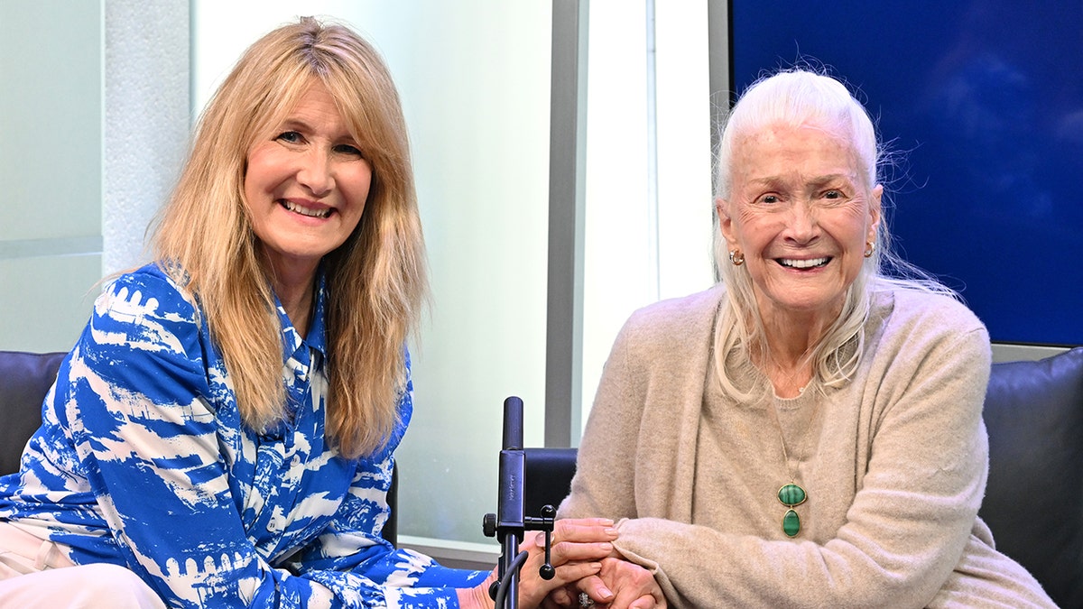 Laura Dern and Diane Ladd holding hands