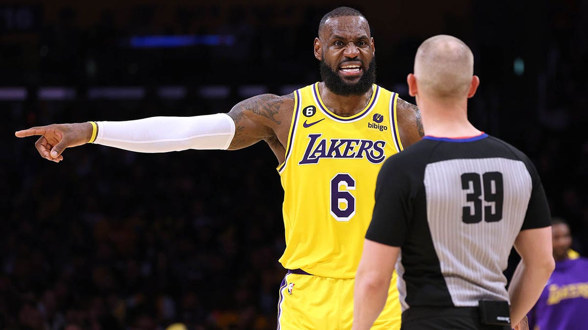 LeBron James arguing with referee Tyler Ford during a basketball game at Crypto.com Arena