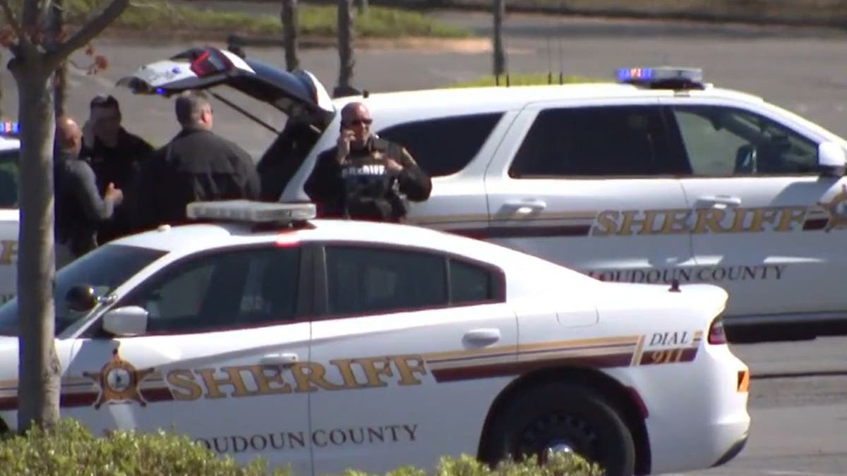 Sheriff's office cars at scene