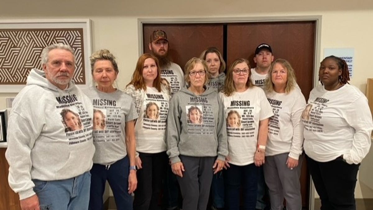 Madeline Kingsbury's family wearing custom made sweatshirts during their search with her description and contact information for tips