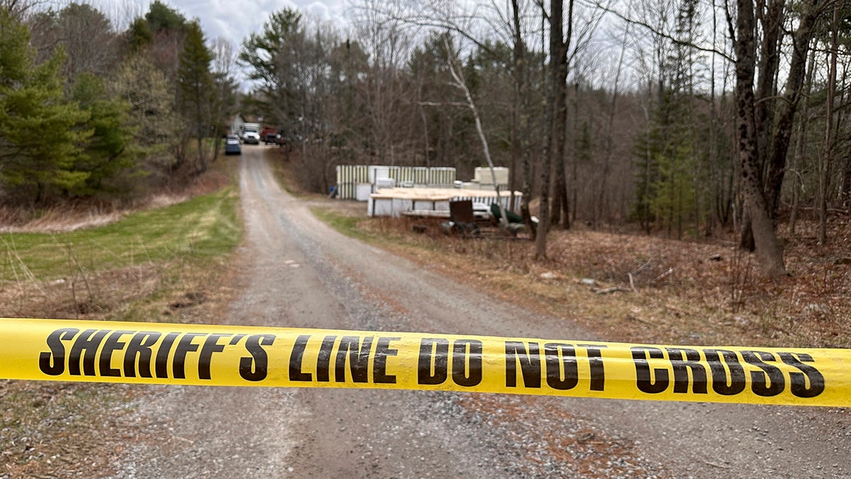 crime scene tape along road