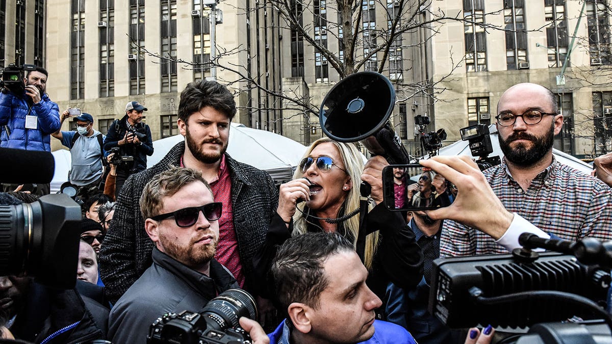 Marjorie Taylor Greene at Trump protest during arraignment