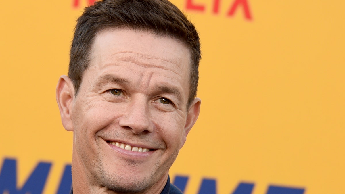 Mark Wahlberg smiles at the premiere of the movie "Me Time."