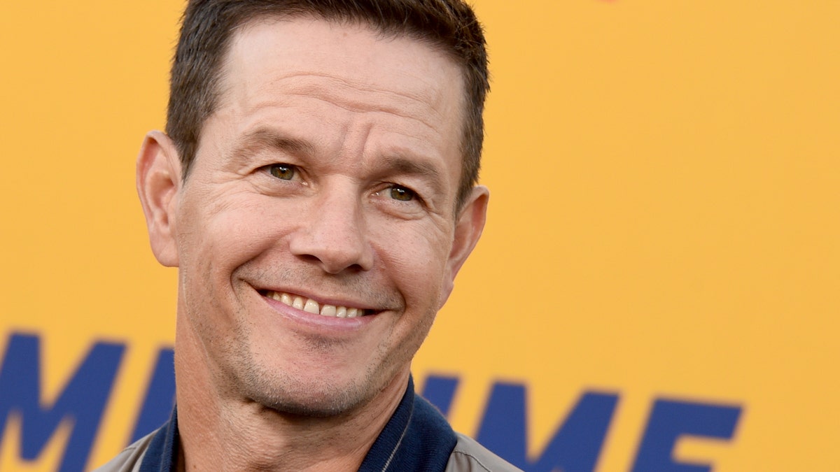 Mark Wahlberg smiles at the premiere of the movie "Me Time."