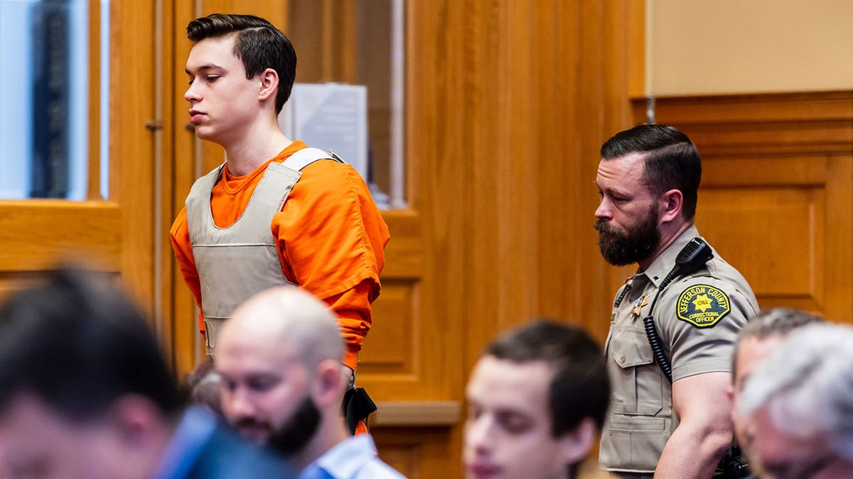 Willard Miller wears orange jumpsuit in courtroom