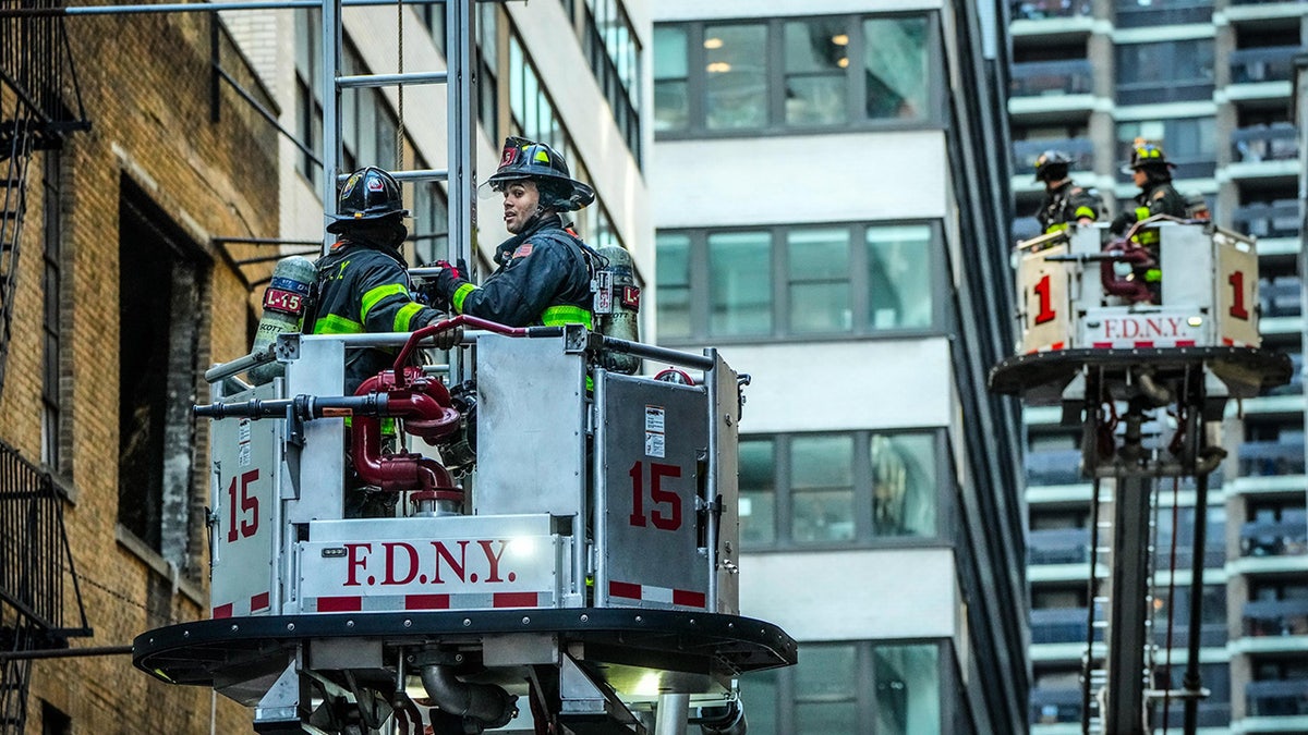 FDNY in cranes by collapse
